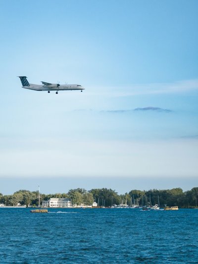 Aircraft on approach over the water to Billy Bishop Toronto City Airport